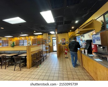 Green County, Ga USA - 12 20 21: Zaxbys Restaurant Interior People Ordering Food