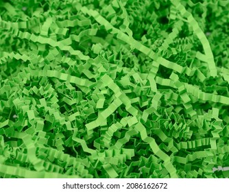 Green Crinkle Shredded Papers For Gift Box And Basket Filling. Backgrounds, Gift And Ornamental Papers Concepts. Horizontal Texture Close-up.