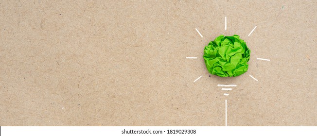 Green crumpled paper light bulb, Corporate Social Responsibility (CSR), eco-friendly business and environmental concept with copy space - Shutterstock ID 1819029308