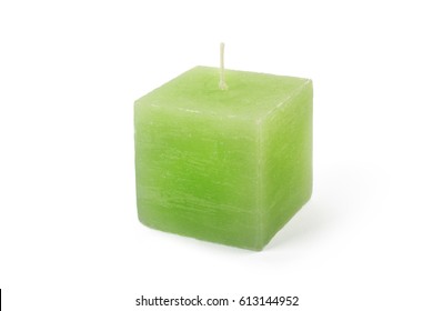 Green cube-shape candle on white background - Shutterstock ID 613144952