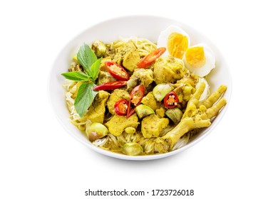 Green curry chicken with rice noodles isolate on white background