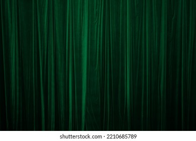 green curtain in theatre background - Shutterstock ID 2210685789