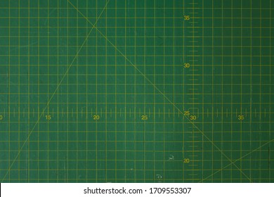 Green Cutting Mat Scale With Scratch Texture From Cutter