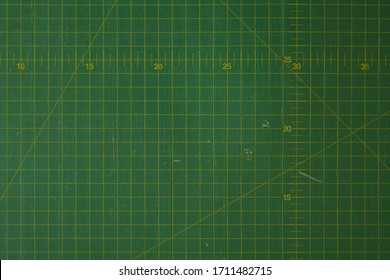 Green Cutting Mat Scale With Scratch Texture From Cutter