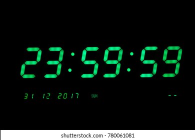 Green Digital LED Clock Showing The Last Second of year 2017 on Black Background.