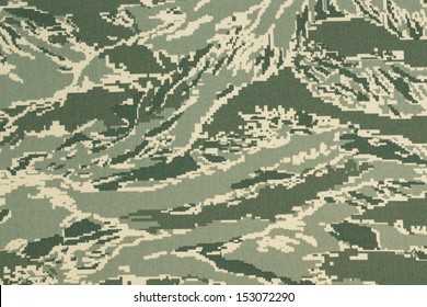 Green Digital Tigerstripe Camouflage Fabric Texture Background