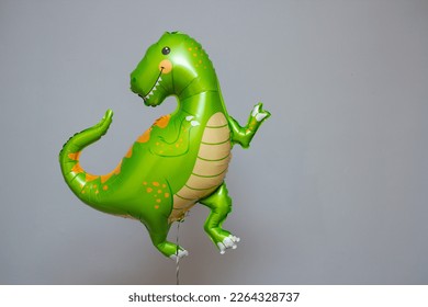 green dinosaur, dinosaur balloon set - Powered by Shutterstock