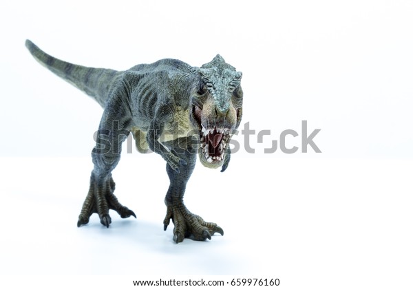 攻撃位置に口を開けた緑の恐竜ティラノサウルス 正面図の白い背景 の写真素材 今すぐ編集