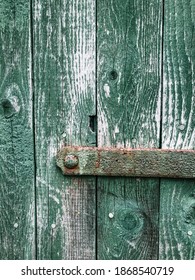 Green door on an old barn.