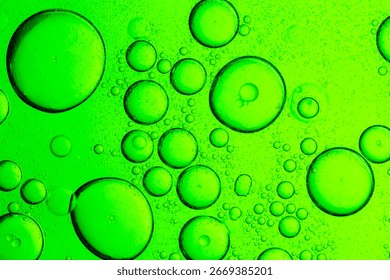 Green drink texture and bubbles macro close up,Water wave, close up of vibrant green liquid with bubbles, capturing dynamic movement and freshness. Perfect for backgrounds, beverages.