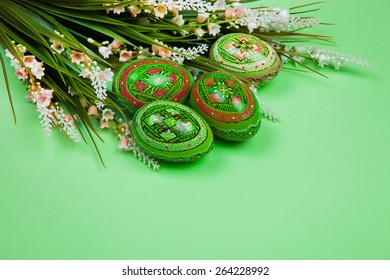 Green Easter Eggs on green Background