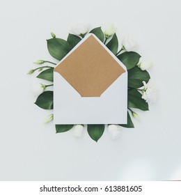 Green Eaves With Envelope. Flat Lay. Minimalist Decorations And Nature Concept