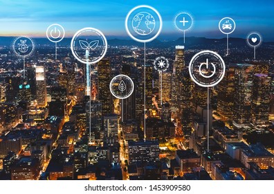 Green eco earth concept with downtown Los Angeles at night - Shutterstock ID 1453909580