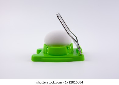 421 Egg Shell Cutter Images Stock Photos Vectors Shutterstock   Green Egg Cutter Boiled Inside 260nw 1712816884 