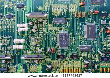 green Electronic system computer motherboard, digital chip with transistor, microcircuit.