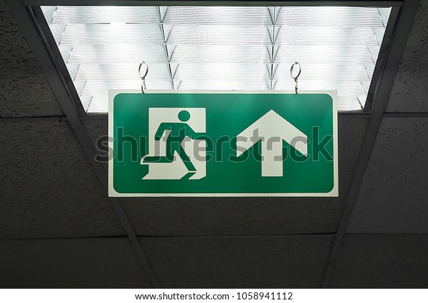 Green Emergency Exit Sign Hang On Signs Symbols Stock Image