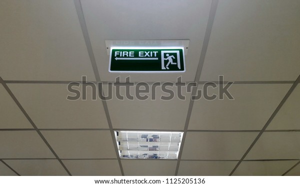 Green Emergency Fire Exit Sign Lighting Stock Photo Edit