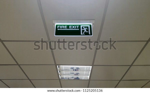 Green Emergency Fire Exit Sign Lighting Stock Photo Edit Now