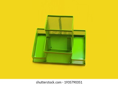 Green Empty Pencil Holder Isolated On Yellow Background