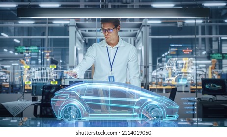 Green Energy Car Design: Automotive Engineer Using Augmented Reality Hologram to Construct 3D Model of High-Tech Electric Vehicle Optimizing Battery Efficiency. Automated Robot Arm Manufacturing