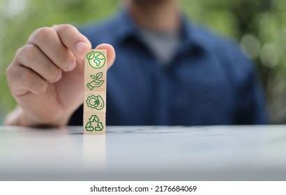 Green Environment Concept On Wood Block In Circular Economy Business, Recycling, Environment, Reuse, Production, Waste, Consumers, Resources, Sustainable Development.