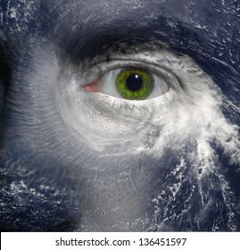 A green eye in the middle of a hurricane - Shutterstock ID 136451597