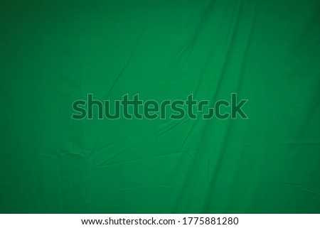 Green fabric for design background.