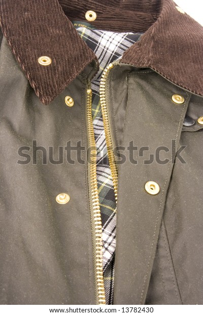 green fashion\
man rain jacket made of wax\
cotton
