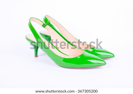 Green female shoes, isolated 
