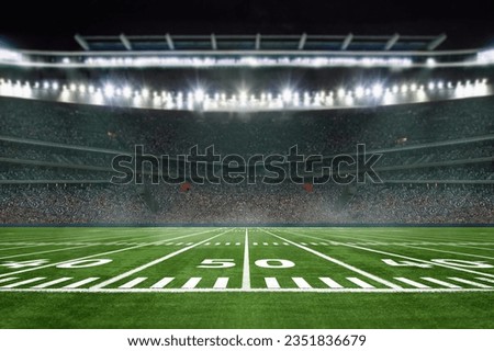 green field in american football stadium. ready for game in the midfield