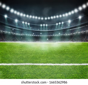 green field in soccer stadium. ready for game - Shutterstock ID 1665362986