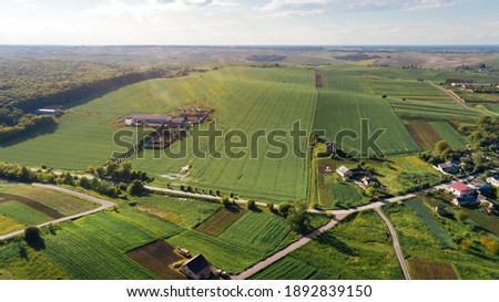 Similar – Image, Stock Photo Landscape with farmland and cloudy sky