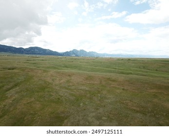 Green fields with mountains in the background