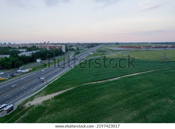 Green fields, view from above. Fields along\
the road. Grow\
agriculture