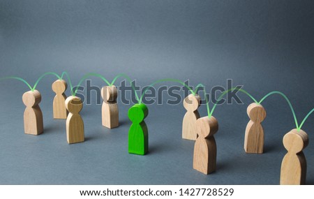 The green figure of a person unites other people around him. Social connections, communication. Organization. Call for cooperation, creating a new team. Leader and leadership, coordination and action,