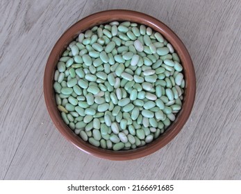 Green Flageolet Bean Close-up In A Clay Dish - Texture Background - Food
