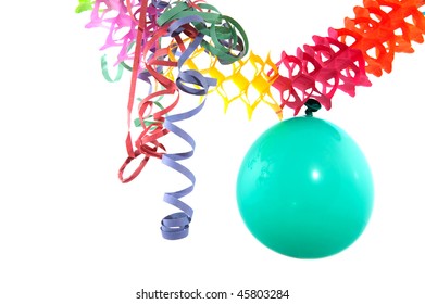 Green Floated Balloon Hanging With Colorful Garland And Party Streamers