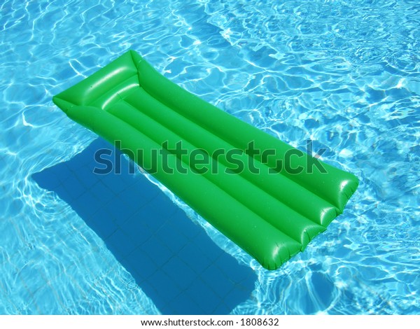 Green Floating Lilo On Swimming Pool Stock Photo 1808632 | Shutterstock