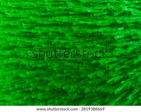 Green fluffy background soft fleecy cloth texture