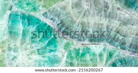 Green Fluorite stone background, natural texture in fresh color as part of your interior work.