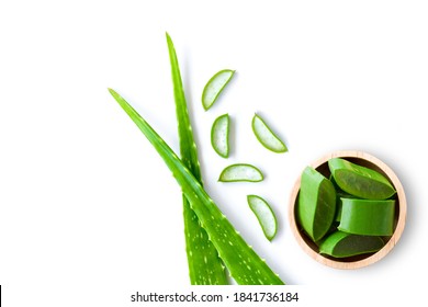 Green Fresh Aloe Vera Leaf With Aloevera Slice In Woodenbowl Isolated On White Background. Top View. Flat Lay.