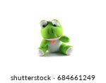 green frog  doll with white background