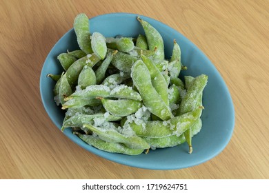 Green Frozen Edamame In Blue Bowl