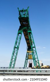 Green Gantry Crane Near The Road Bridge