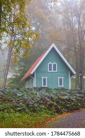 Green Garden Shed In Autumn Fog