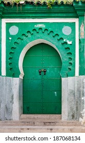 Green gate of ancient mosque in Medina. Tangier, Morocco