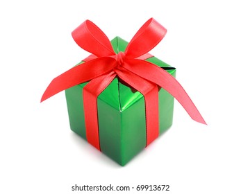 Green Gift Wrapped Present With Red Satin Ribbon Bow Isolated On White