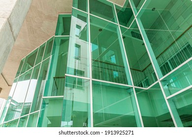 Green Glass Wall Of The Office Building 