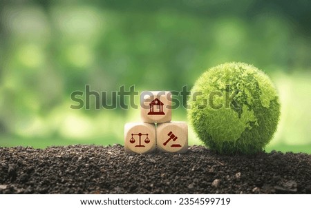 green globe and hammer icon Scales of Justice and the Concept of Environmental Law book contain laws governing the global economy based on environmental sustainability principles.
