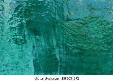 Green Glossy Glaze On The Surface Of Ceramic Tiles. 